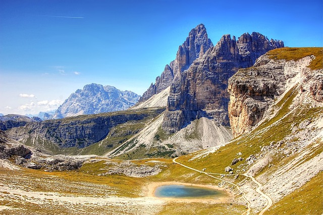 dolomites, three peaks, mountains, alps, italy, rock, south-tirol, big pinnacle, lavaredo, dolomite, western zinne, climbing wall, rock face, steep wall, nature, small gargoyle, rubble field, natural wonders, summer, clouds, landscape, rockclimbing, path, trail, mountain world, viewpoint, mood, lake, tourism, idyllic, hike, riverbank, heaven, romantic, outlook, foresight, blue sky, expanse, rise, alone, pitch