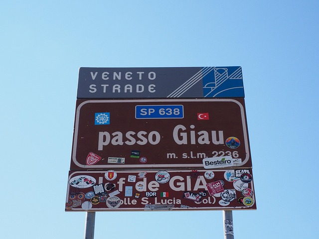 giau pass, sign, pass shield, traffic sign, passo di giau, italy, dolomites